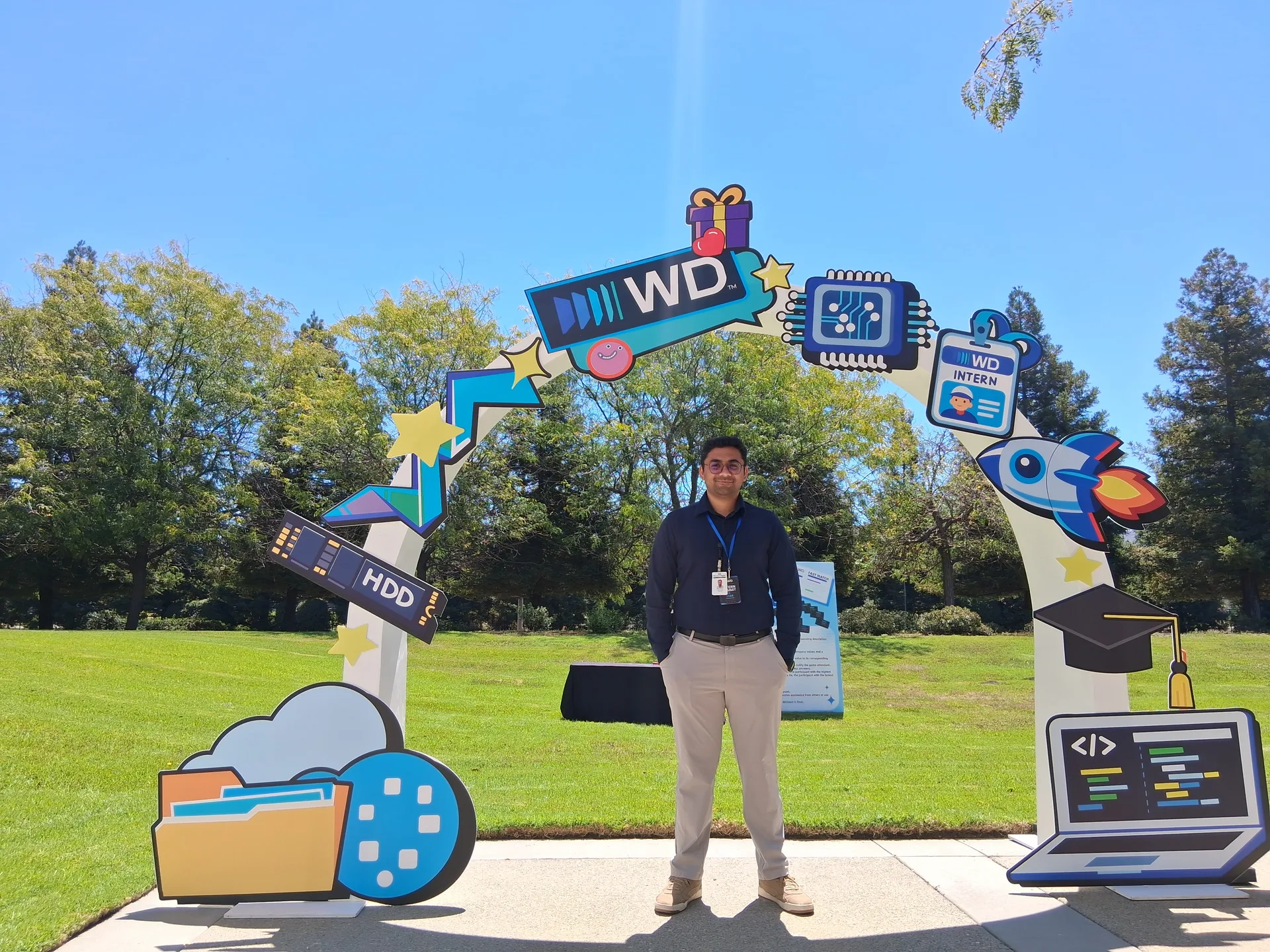Hariprashad Ravikumar under the Western Digital Intern Summit welcome arch on the San Jose campus
